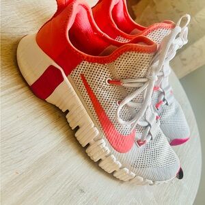 Nike Women's Pink, coral and off white stylishly Sneakers